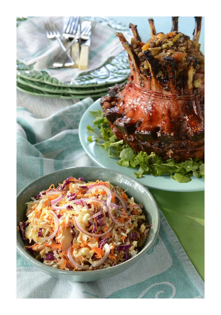 Crown roast pork with fruit stuffing served with brown rice coleslaw