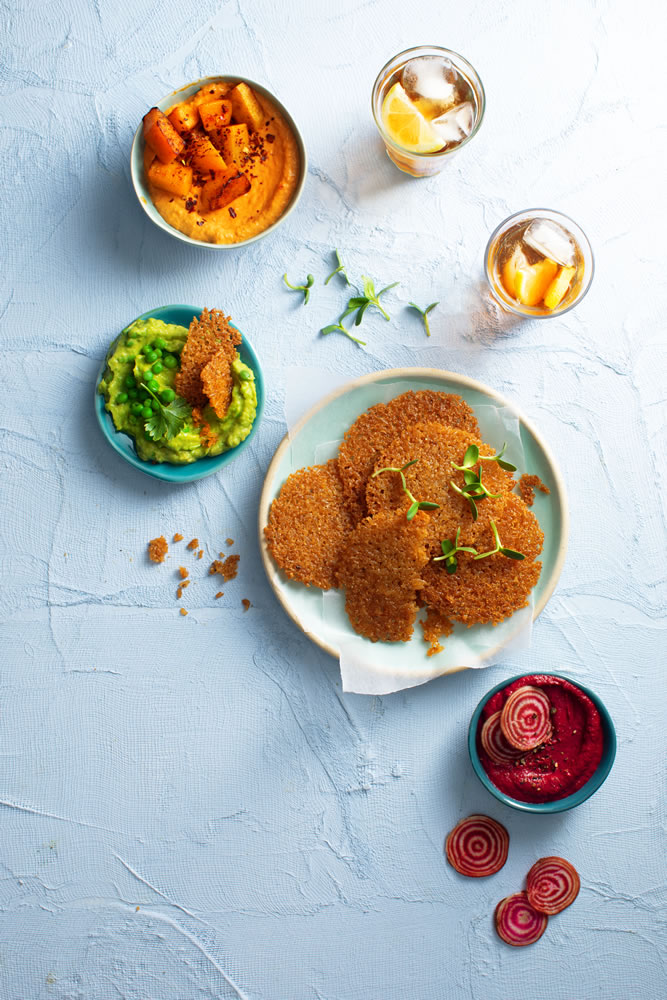 Homemade rice crackers with a trio of dips – pea & parsley, beetroot & spiced butternut